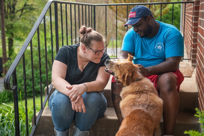 Georgia and her partner, Marcus, with one of their rescued seniors, Golith.