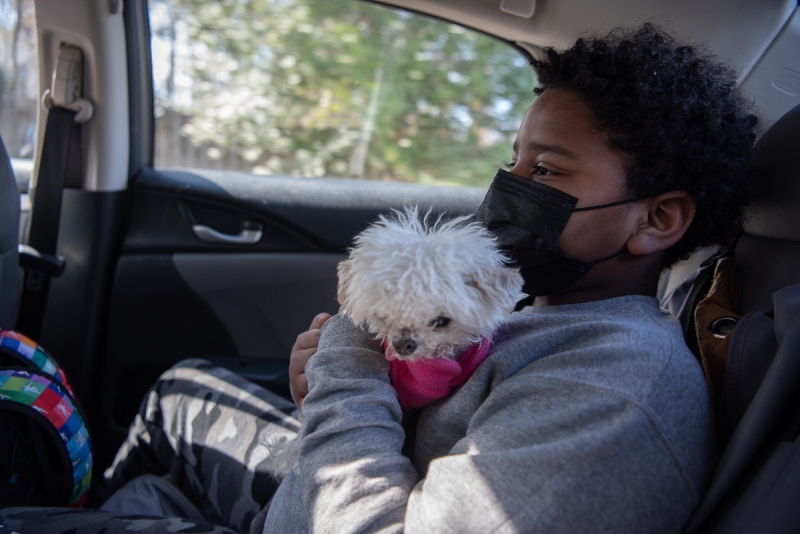 Georgia gives her godchild, Jayce, a ride home from school (where she also works).